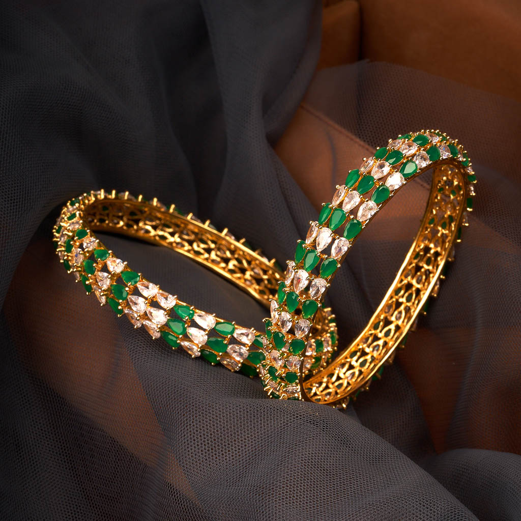 Stunning 1gm gold green white American diamond bangles.